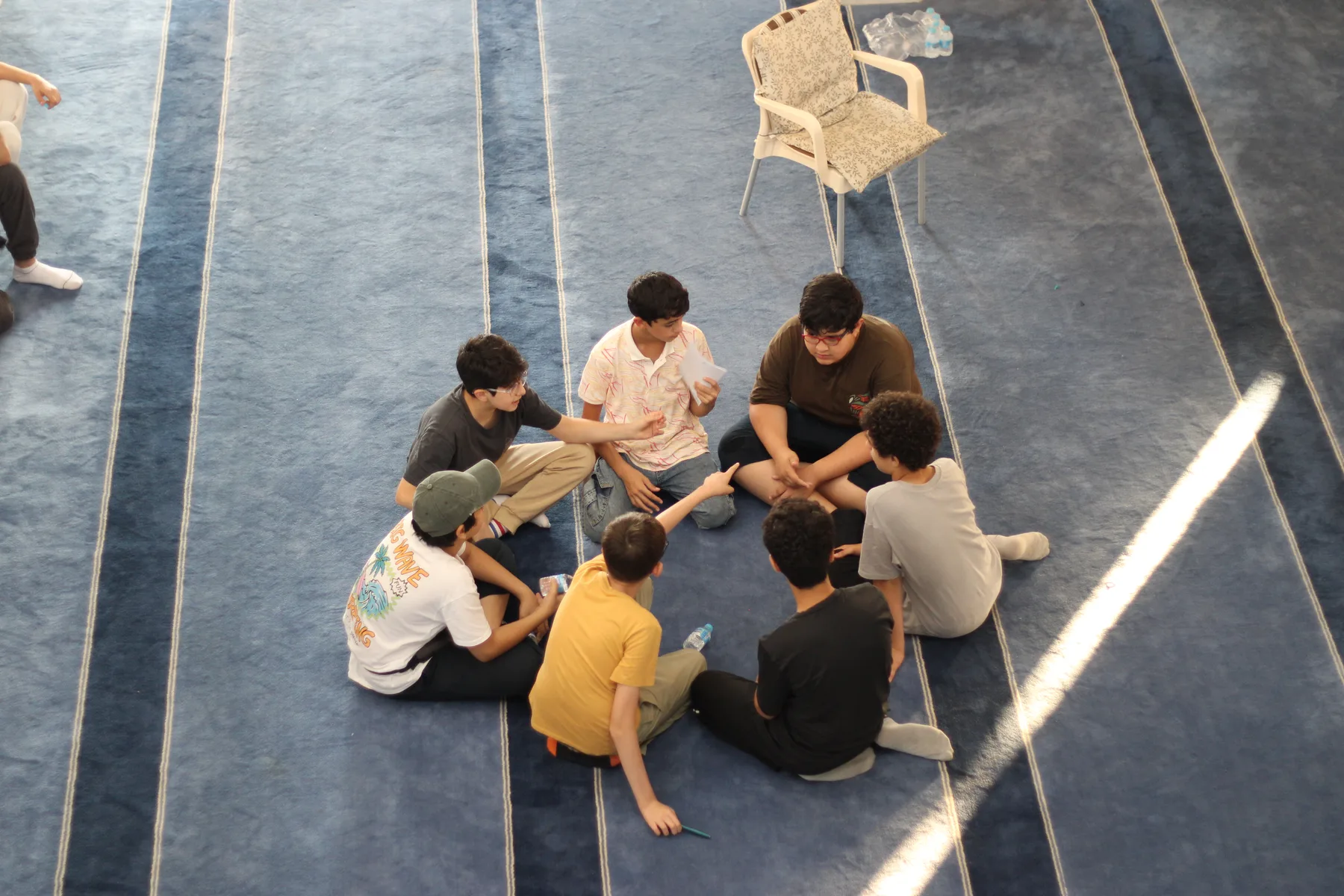 The youngest work in groups of a few, so each of them gets read with directly.